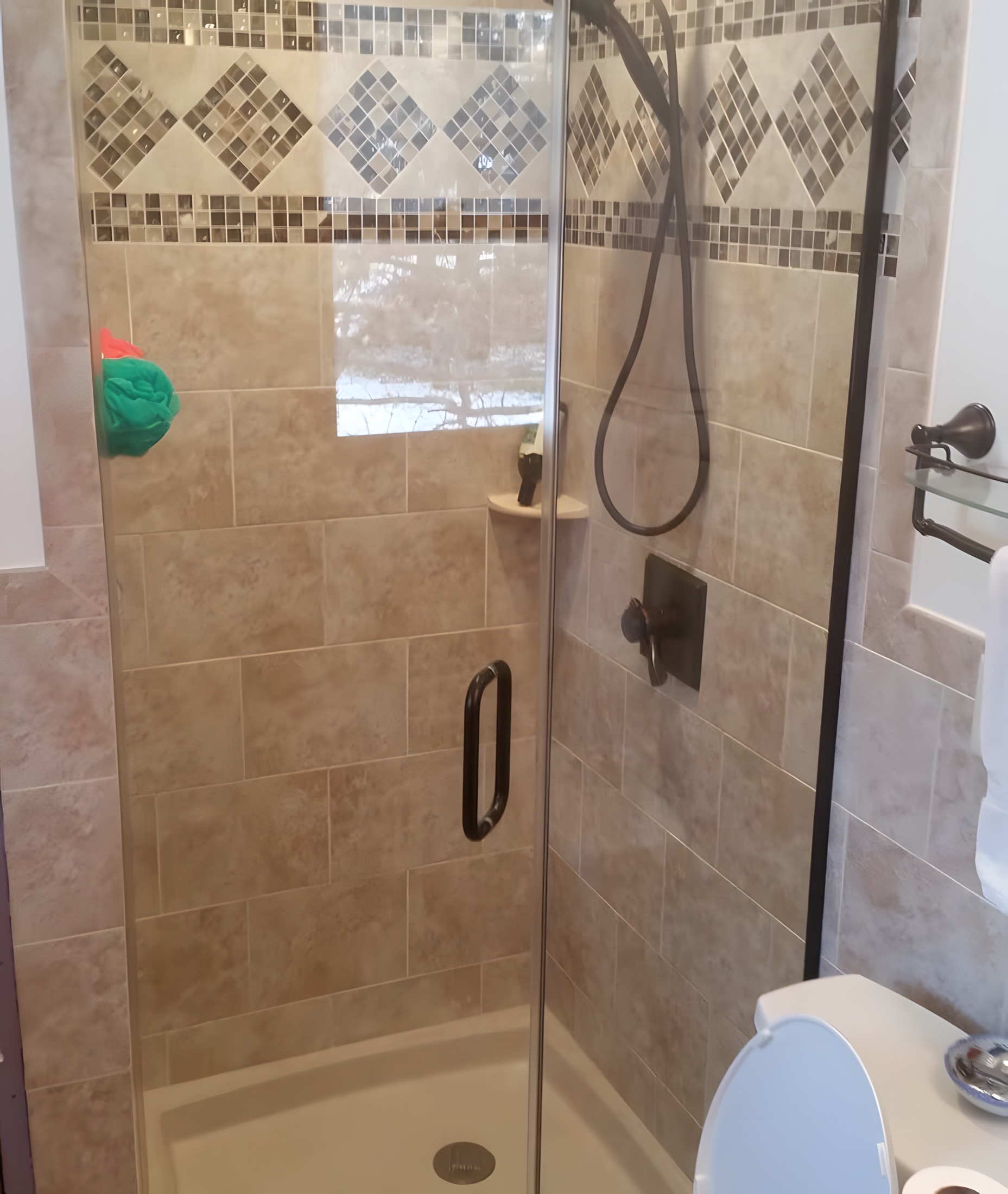 Walk-in tile shower by Gene Laughner Construction in Erie, PA